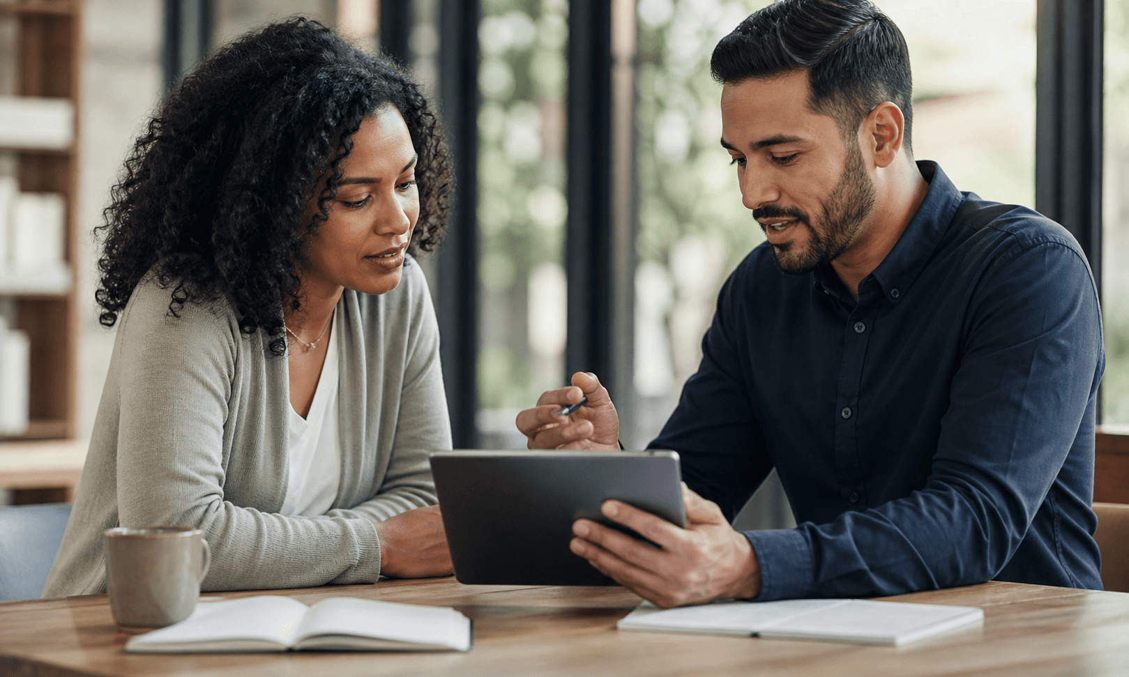 A customer and service professional reviewing service details together